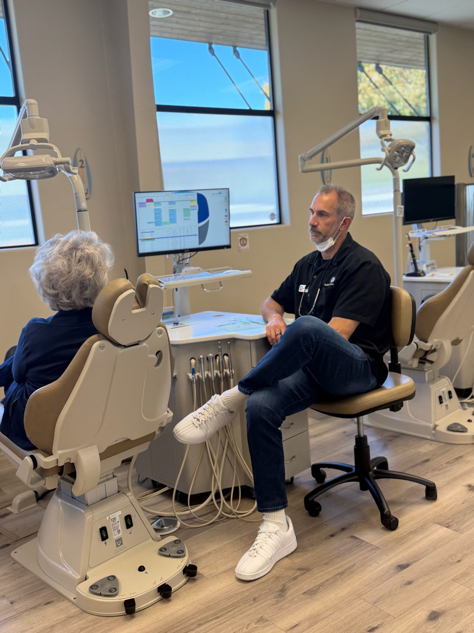 Dr. Garrett with an adult patient.