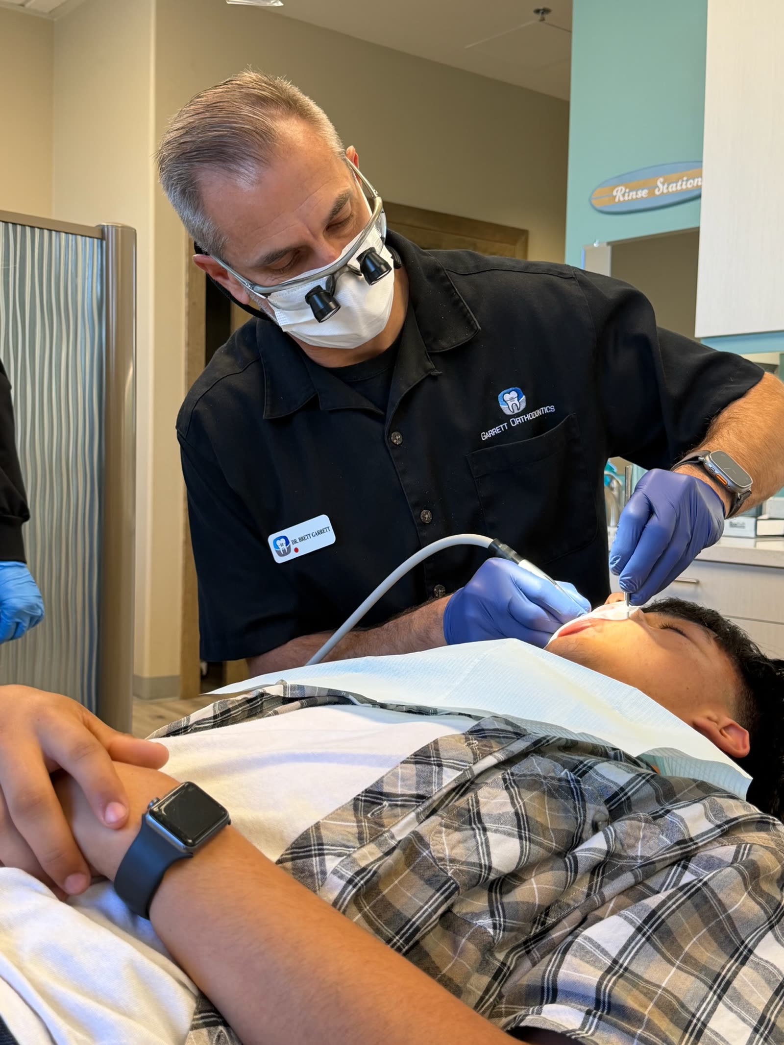 Dr. Garrett treating a patient.