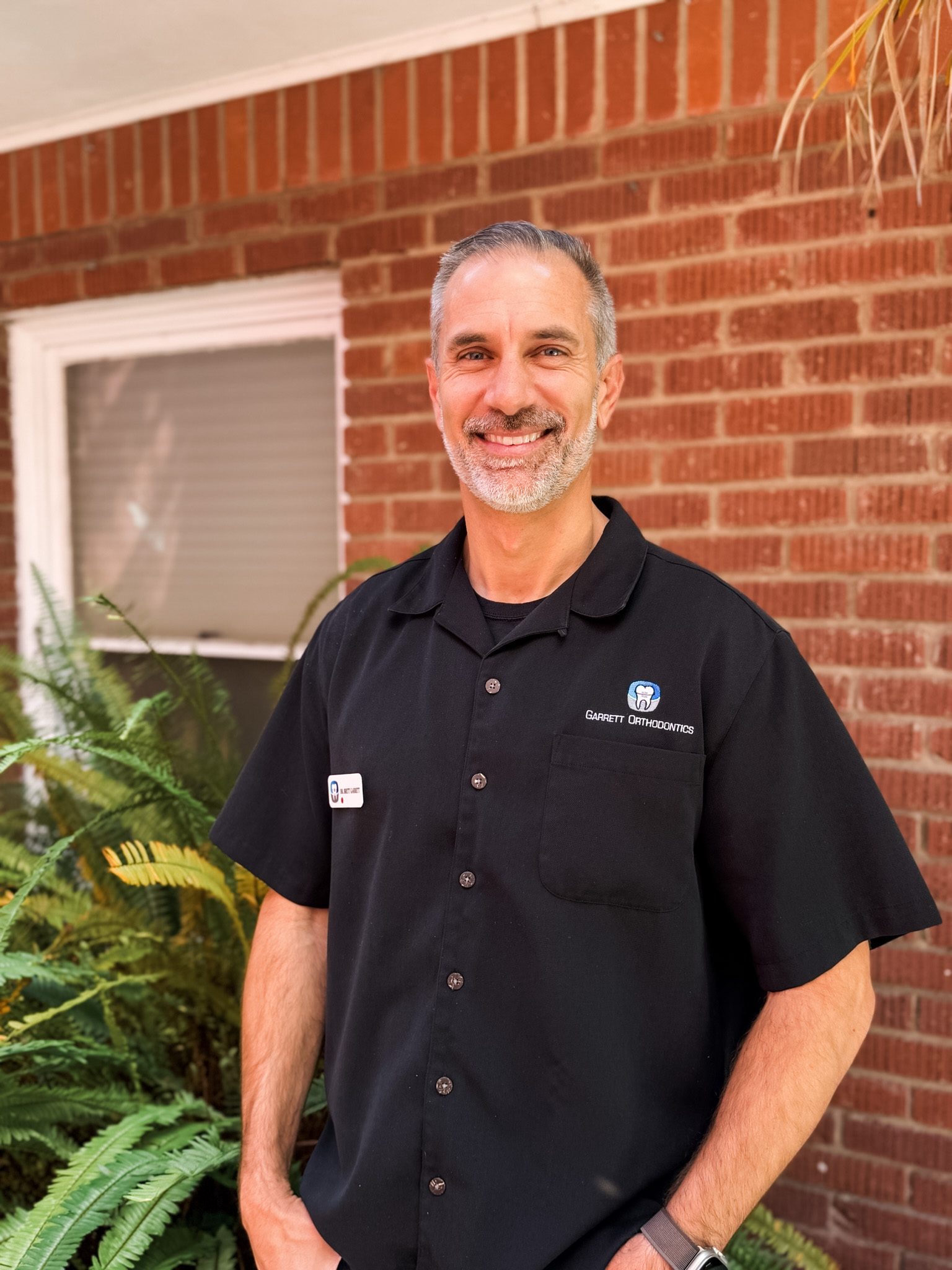 Dr. Garrett outside the San Luis Obispo office on Garden Street.