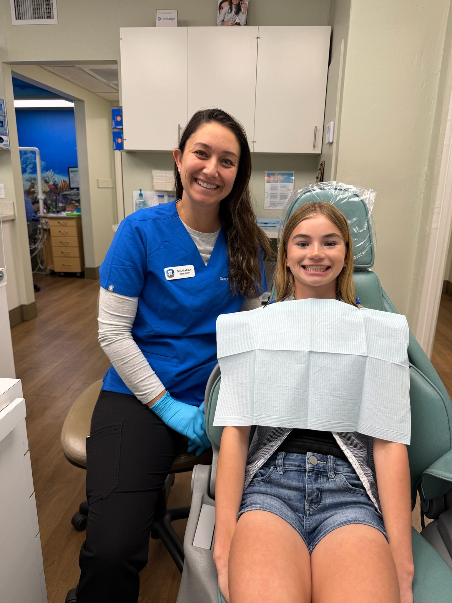 A team member with a patient in the San Luis Obispo treatment bay.